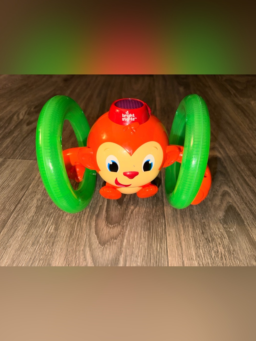 Orange Monkey Rolling Toy with Green Wheels - Kids